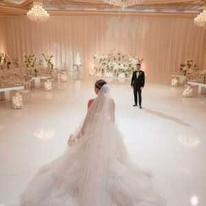 Fitted wedding dress with tule overskirt